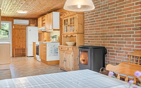 Iivo - 3.5Km from the Sea: Furniture, Wood, Interior Design, Ceiling, Room, Cabinetry, Kitchen, Home, Chair, Wood Stain