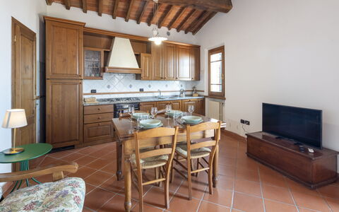 La Casina: Furniture, Interior Design, Wood, Flooring, Kitchen, Room, Ceiling, Floor, Cabinetry, Home