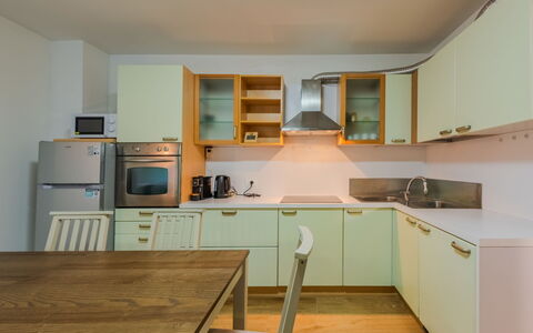 La Corona: Kitchen, Kitchen Appliance, Interior Design, Countertop, Major Appliance, Cabinetry, Flooring, Wood, Ceiling, Furniture