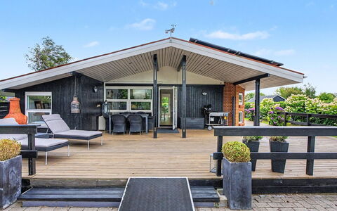 Annalina - 230M from the Sea: Roof, Home, Door, Porch, Cottage, Shade, Deck, Siding, Outdoor Structure, Awning