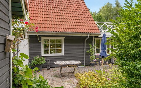 Lonneke - from the Sea: Roof, House, Land Lot, Home, Cottage, Estate, Garden Buildings, Shade, Log Cabin, Landscaping