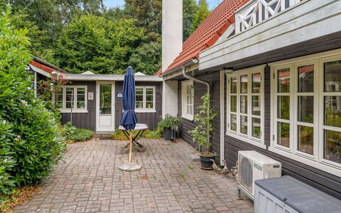 Lonneke - from the Sea: Roof, House, Land Lot, Home, Cottage, Estate, Garden Buildings, Shade, Log Cabin, Landscaping