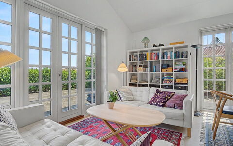 Ion - 1Km from the Sea: Furniture, Interior Design, Flooring, Couch, Floor, Living Room, Wood, Room, Ceiling, Table