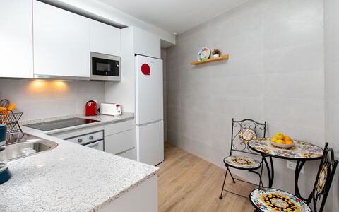 Elvix Nerja Center a: Kitchen, Wall, Flooring, Countertop, Major Appliance, Interior Design, Floor, Kitchen Appliance, Furniture, Room