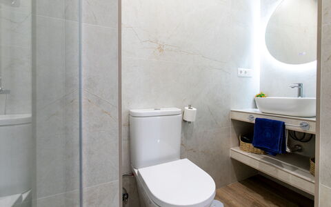 Elvix Nerja Center a: Toilet Seat, Bathroom, Toilet, Plumbing Fixture, Flooring, Wall, Floor, Interior Design, Sink, Plumbing