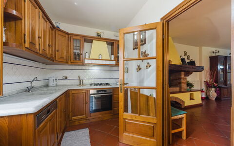 Casa Lulù: Interior Design, Furniture, Flooring, Wood, Ceiling, Floor, Cabinetry, Kitchen, Room, Countertop