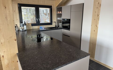 Großveitsch 607: Kitchen, Flooring, Countertop, Cabinetry, Granite, Natural Material, Kitchen Appliance, Major Appliance, Wood Stain, Home Appliance