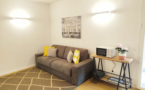 Lola Home - Levanto: Furniture, Interior Design, Flooring, Wall, Couch, Floor, Wood, Room, Ceiling, Living Room