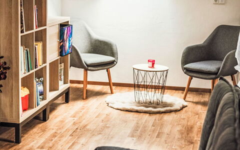 U Šenkýře Mikeše: Furniture, Interior Design, Flooring, Floor, Wood, Living Room, Wood Flooring, Room, Home, Chair