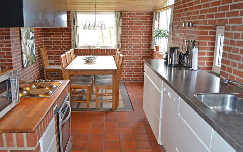 Scarlet - 500M from the Sea: Kitchen, Wood, Countertop, Flooring, Kitchen Appliance, Cabinetry, Furniture, Interior Design, Brick, Floor