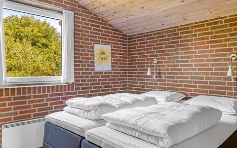 Scarlet - 500M from the Sea: Ceiling, Bed, Bedroom, Brick, Bed Frame, Bedding, Bed Sheet, Wood Stain, Daylighting, Pillow