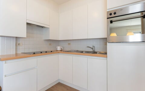 Goldsands Iii with Parking: Kitchen, Kitchen Appliance, Countertop, Cabinetry, Major Appliance, Flooring, Interior Design, Wood, Floor, Kitchen Stove