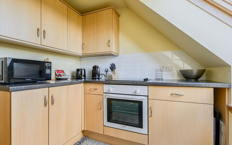 Bunloit Loft: Interior Design, Flooring, Floor, Cabinetry, Drawer, Wood Stain, Hardwood, Countertop, Kitchen