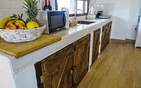 Mar de Cristal Playa Honda 500: Wood, Furniture, Cabinetry, Flooring, Countertop, Floor, Cupboard, Drawer, Wood Stain, Kitchen