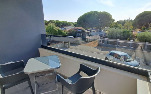 Duplex: Blue, Balcony, Handrail, Apartment, Fence, Sea, Resort, Condominium, Swimming Pool, Hotel