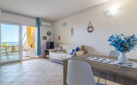 Sunset House Isola Rossa: Blue, Balcony, Handrail, Apartment, Fence, Sea, Resort, Condominium, Swimming Pool, Hotel