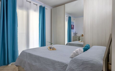 Sunset House Isola Rossa: Blue, Balcony, Handrail, Apartment, Fence, Sea, Resort, Condominium, Swimming Pool, Hotel