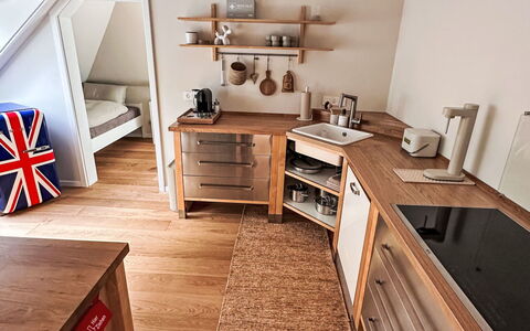 The Oak Suite: Furniture, Interior Design, Flooring, Wood, Floor, Ceiling, Lighting, Room, Kitchen Appliance, Kitchen