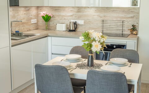 Smichov Kosire Jinonice 1: Furniture, Interior Design, Countertop, Flooring, Kitchen, Wood, Cabinetry, Kitchen Appliance, Home, Table