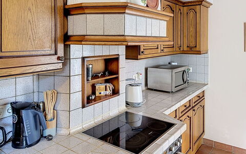Janike: Kitchen, Countertop, Cabinetry, Kitchen Appliance, Interior Design, Flooring, Wood, Furniture, Major Appliance, Floor