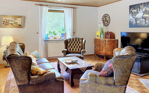 Janike: Furniture, Interior Design, Flooring, Couch, Wood, Floor, Room, Ceiling, Table, Living Room