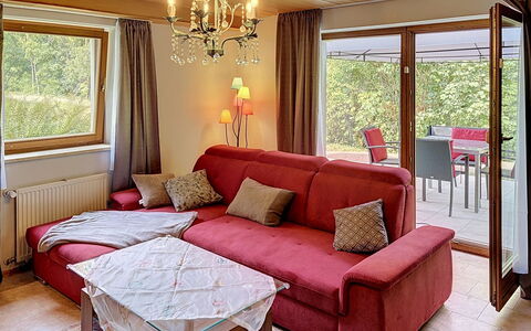 Janike: Furniture, Interior Design, Couch, Flooring, Floor, Room, Wood, Living Room, Ceiling, Table