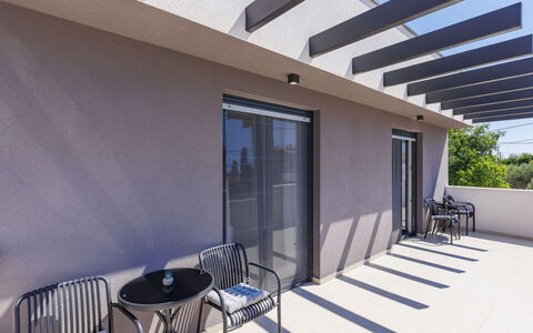 Laluma: Floor, Composite Material, Balcony, Outdoor Furniture, Apartment, Shade, Chair, Patio, Concrete, Deck
