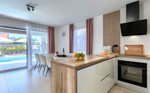 Laluma: Interior Design, Flooring, Countertop, Wood, Furniture, Floor, Kitchen, Home, Cabinetry, Lighting