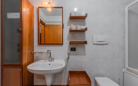 Michelon: Bathroom Sink, Bathroom, Sink, Plumbing Fixture, Flooring, Mirror, Interior Design, Wood, Floor, Tap
