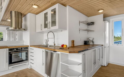 Tuva - 3.5Km from the Sea: Kitchen, Countertop, Flooring, Kitchen Appliance, Cabinetry, Interior Design, Furniture, Wood, Floor, Major Appliance