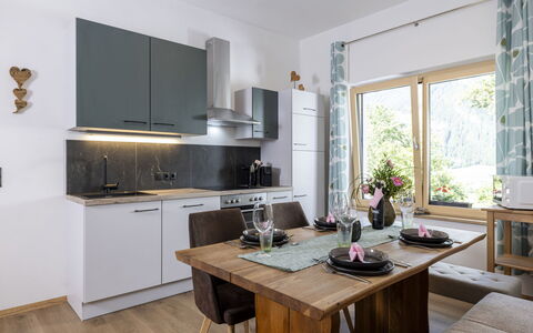 Eberharter am Schweinberg: Furniture, Interior Design, Kitchen, Countertop, Flooring, Kitchen Appliance, Wood, Chair, Cabinetry, Ceiling