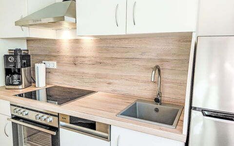 Herzwerk Schwalenberg: Countertop, Kitchen, Kitchen Appliance, Wood, Flooring, Cabinetry, Major Appliance, Interior Design, Floor, Sink