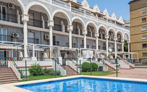 Los Arcos: Balcony, Apartment, Porch, Baluster, Estate, Courtyard, Fence, Arcade, Handrail, Hotel
