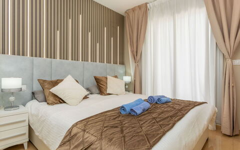 Sol Y Mar i: Furniture, Interior Design, Flooring, Floor, Bed, Wall, Bedroom, Wood, Room, Ceiling