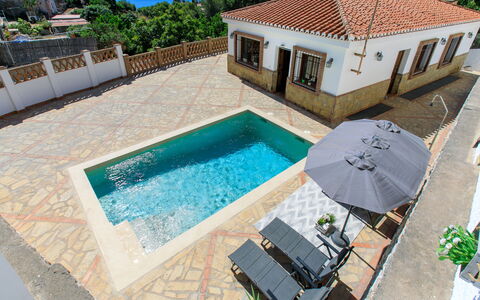 Portichuelo: Swimming Pool, Resort, Composite Material, Estate, Tile, Leisure, Flagstone, Eco Hotel, Villa, Outdoor Furniture