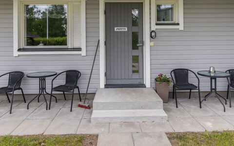Pirtti: Door, Home, Siding, Floor, Home Door, Porch, Yard, Shade, Paint