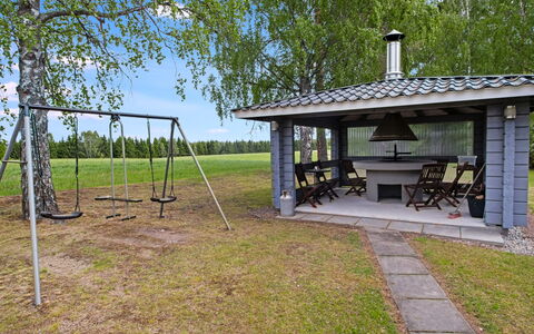 Pirtti: Grass, Land Lot, Roof, Shade, Garden, Lawn, Outdoor Structure, Yard, Backyard, Landscaping