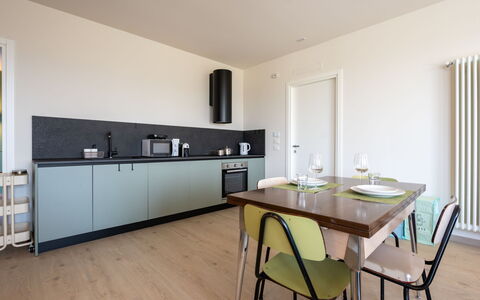 Serracapelli: Furniture, Interior Design, Flooring, Kitchen, Wood, Countertop, Floor, Kitchen & Dining Room Table, Lighting, Table