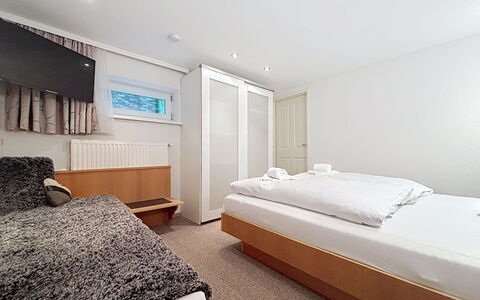 Susi: Bed, Bedroom, Interior Design, Floor, Flooring, Wood, Bed Sheet, Bedding, Ceiling, Room
