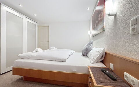 Susi: Interior Design, Ceiling, Flooring, Furniture, Floor, Bed, Bedroom, Room, Lighting, Bedding