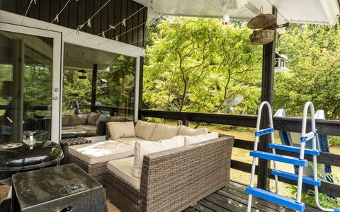 Tarvo - 500M to the Fjord: Furniture, Wood, Porch, Chair, Ceiling, Interior Design, Table, Shade, Couch, Outdoor Furniture