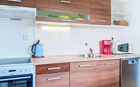 Green Valley Park Stárkov 18: Cabinetry, Countertop, Flooring, Wood, Furniture, Interior Design, Kitchen Appliance, Kitchen, Major Appliance, Drawer