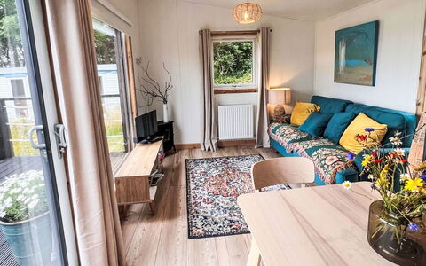 Tiny Mara: Furniture, Interior Design, Flooring, Floor, Wall, Wood, Room, Couch, Living Room, Table