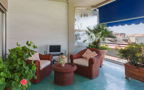 Appartamento la Terrazza di Anna: Flowerpot, Furniture, Houseplant, Shade, Outdoor Furniture, Chair, Balcony, Eco Hotel, Patio
