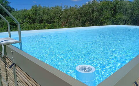 Podere Dolce Sonno e Sonnellino: Blue, Swimming Pool, Composite Material, Shade, Leisure, Resort, Eco Hotel, Plastic, Water Feature, Backyard