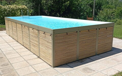 Podere Dolce Sonno e Sonnellino: Swimming Pool, Floor, Composite Material, Shade, Wood Stain, Hardwood, Design, Plank, Plywood, Backyard