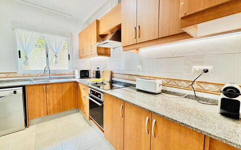 Calma: Kitchen, Flooring, Floor, Major Appliance, Home, Kitchen Appliance, Kitchen Sink, Furniture, Cabinetry, Countertop