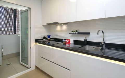 Arenal Beach: Kitchen, Countertop, Interior Design, Wood, Kitchen Appliance, Flooring, Major Appliance, Ceiling, Plumbing Fixture, Kitchen Sink