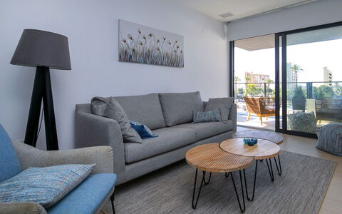 Arenal Beach: Furniture, Couch, Flooring, Interior Design, Floor, Living Room, Table, Coffee Table, Chair