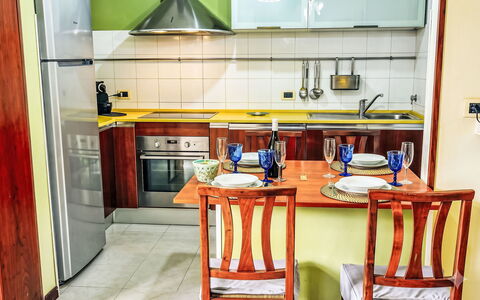 Marina di Massa 651: Furniture, Kitchen, Kitchen Appliance, Major Appliance, Flooring, Interior Design, Wood, Countertop, Floor, Room